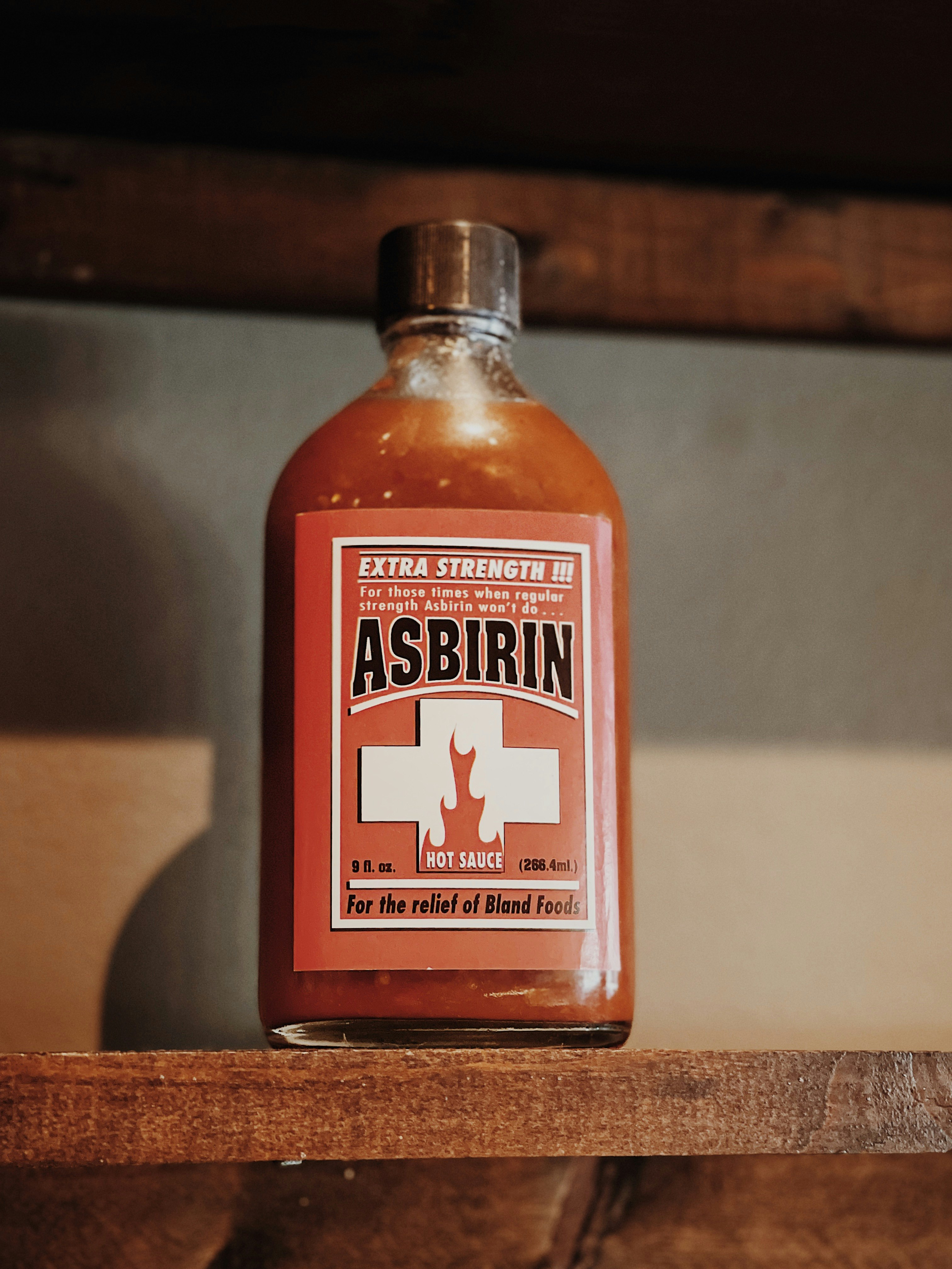 heinz tomato ketchup bottle on brown wooden table